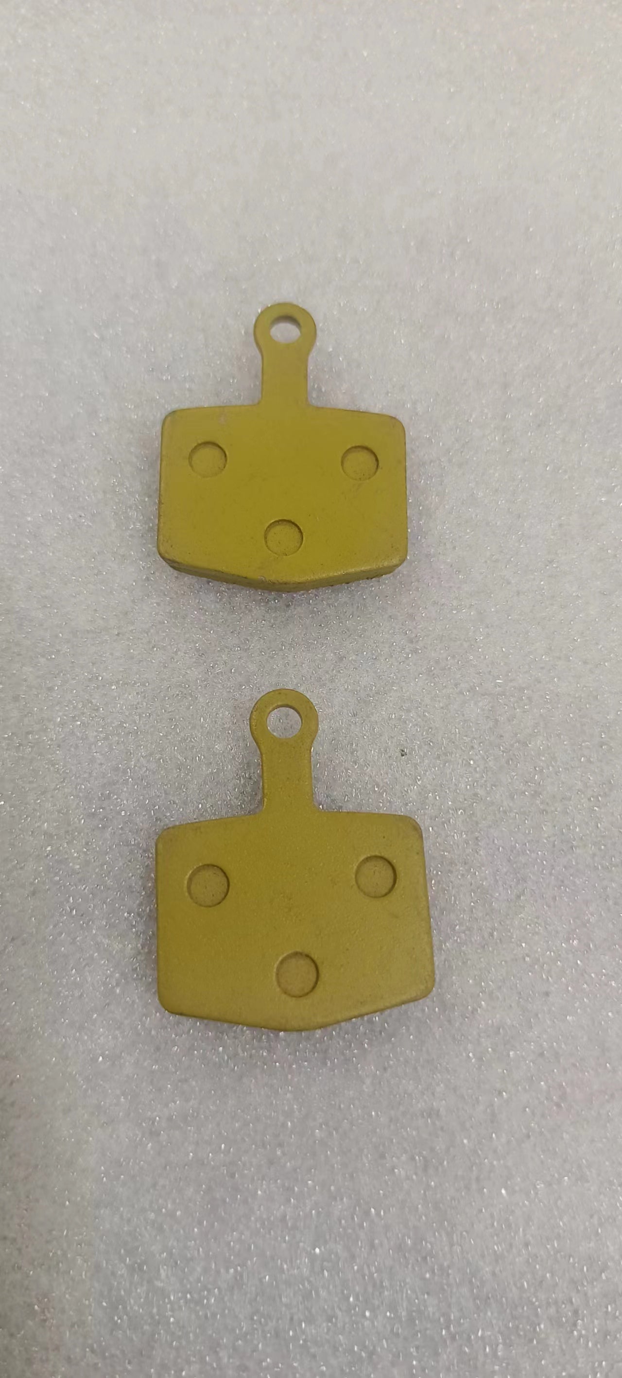 Lankeleisi electric bike brake pads installed on bike's wheel, showcasing durable brake components for electric bicycle safety.