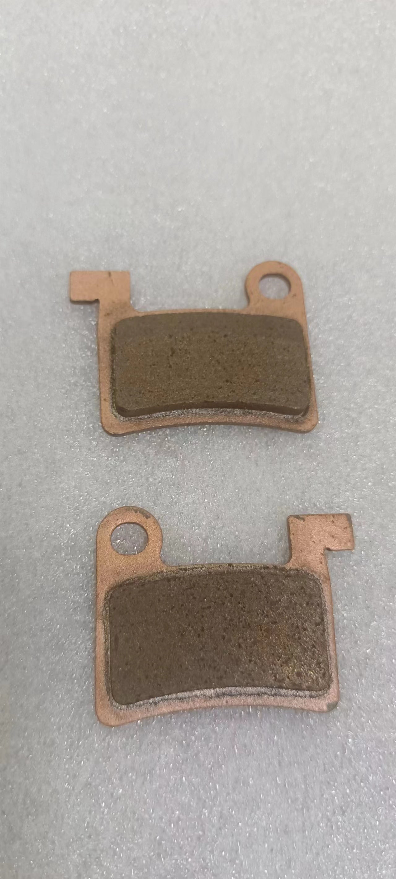 Black brake pads for Lankeleisi electric bike, compatible with MG740, X3000MAX, BlackKnight, and X2000 models, shown in black color.