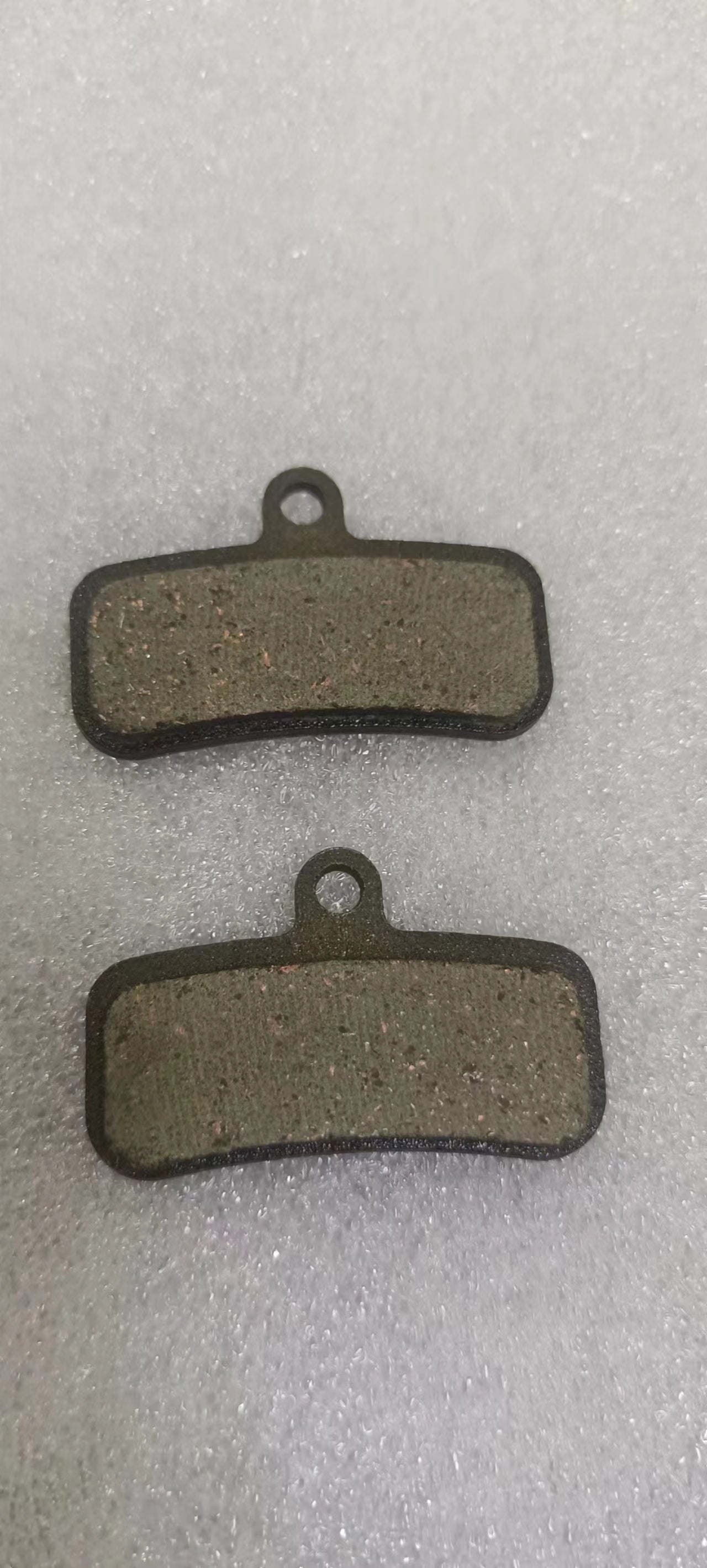 Lankeleisi electric bike brake pads, showing close-up of the brake pad components and lining for the RV800 model.
