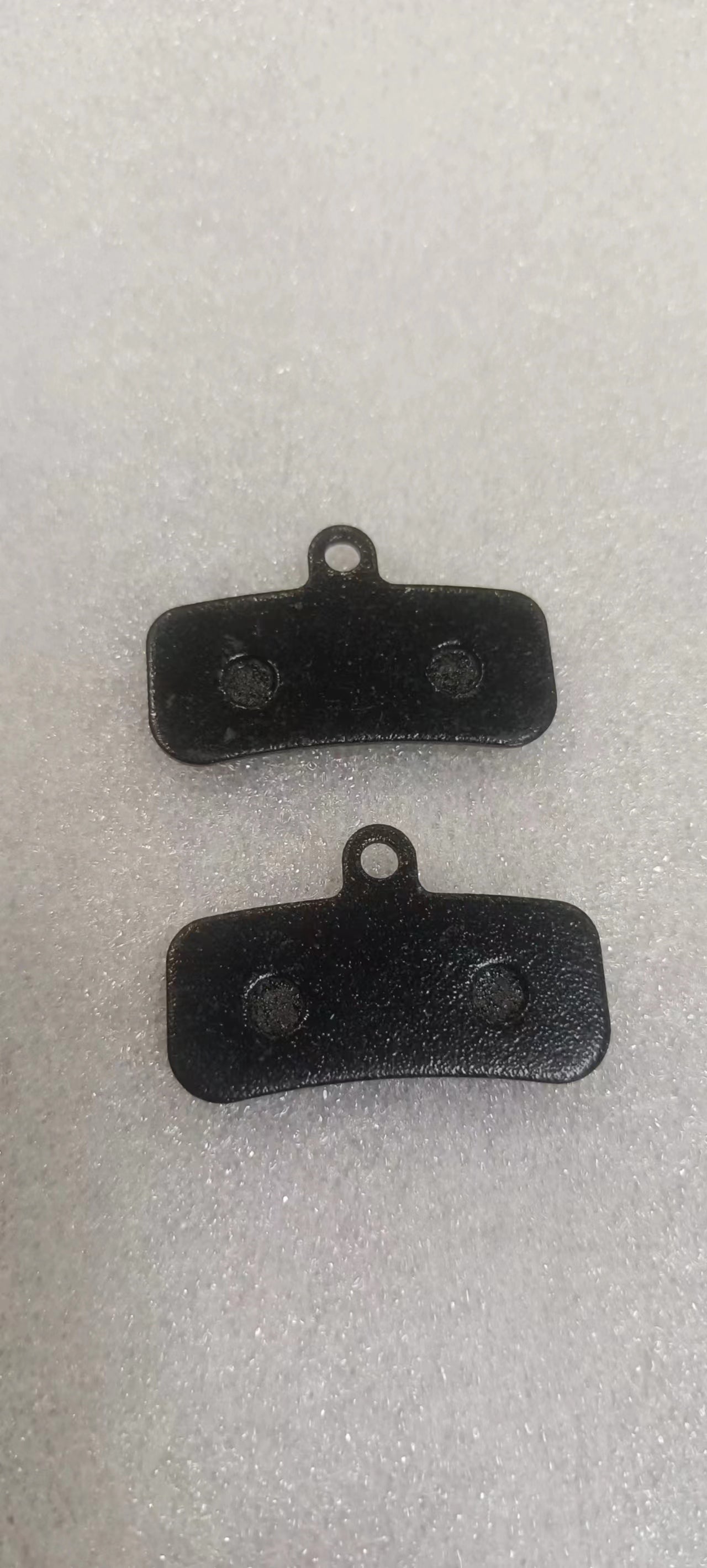 Lankeleisi electric bike brake pads with black metal and rubber components for RV800 model, showing close-up of brake pad design